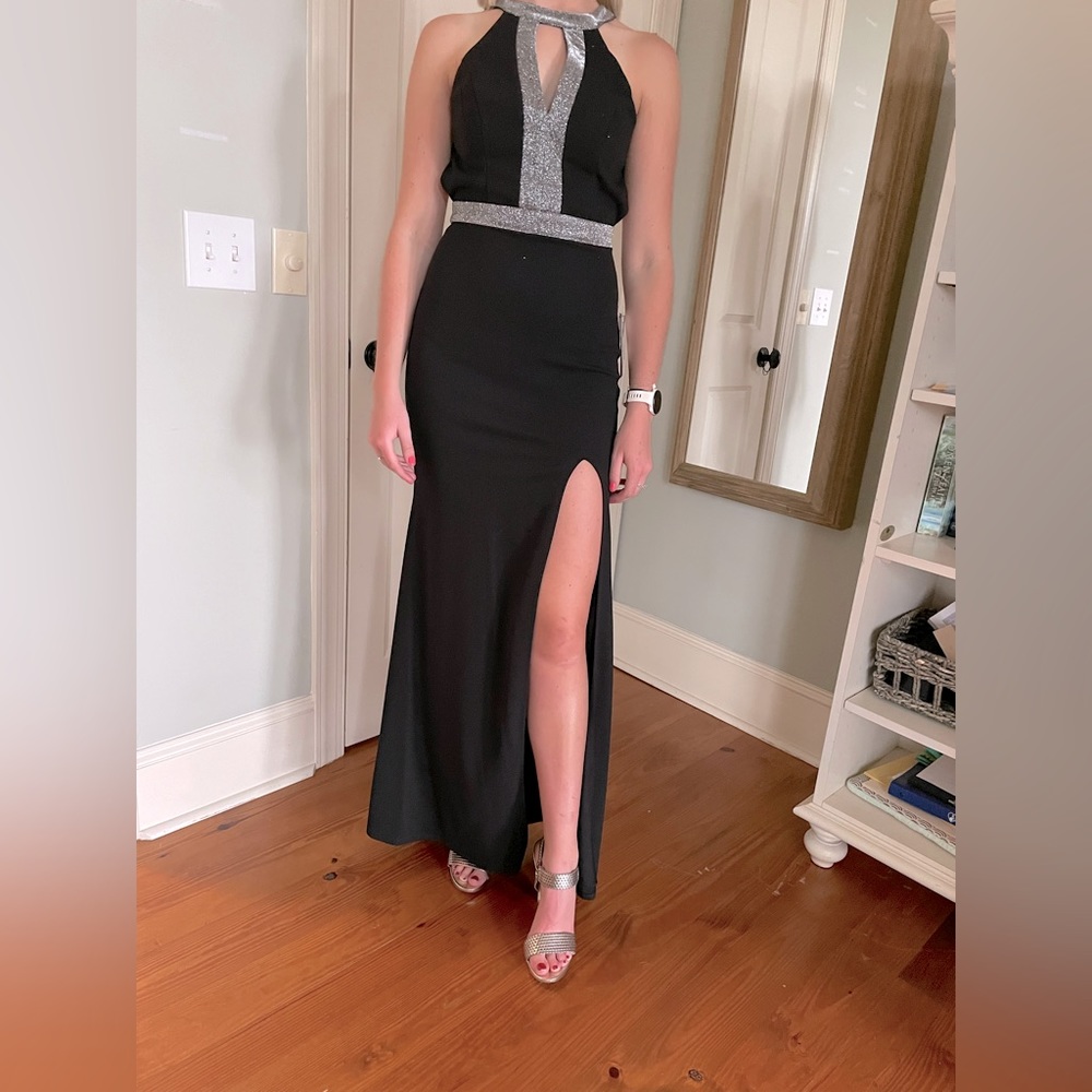 Black formal length dress with silver trim